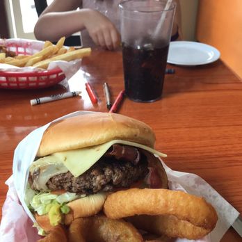 Dale's Essenhaus - Baja Burger (avocado, pepper jack cheese and bacon) and a side of onion rings. So delicious! Amazing onion rings! - Burgers Near Me - Georgetown, Texas