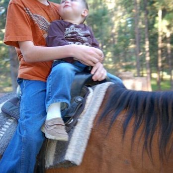 Flying J Ranch - My son who is now 20 with my grandson who is now 9. His momma did the same thing at that age and now she is 32. - American Near Me - Alto, New Mexico