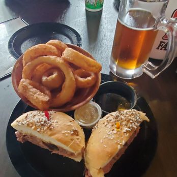 Duff's Famous Wings - Beef on Weck with onion rings - Chicken Wings Near Me - Tampa, Florida Duff's Famous Wings - Beef on Weck with onion rings - Chicken Wings Near Me - Tampa, Florida