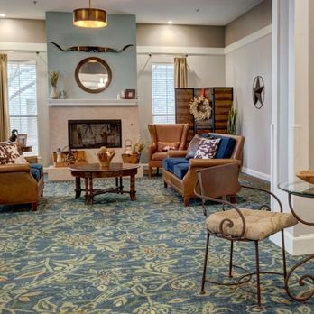 Ridgmar Place - Ridgmar Place | Independent Living | Fort Worth, TX | Lobby seating around a fireplace - Retirement Homes Near Me - Fort Worth, Texas