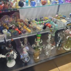 Paradise Smoke Shop - In the case by the register