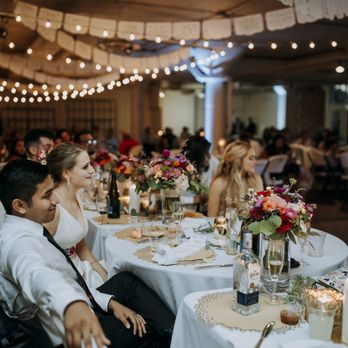 Magnolia's - Bridal bouquets on the head table. (Photographer: Photography and design by Lauren) - Florists Near Me - Louisville, Kentucky Magnolia's - Bridal bouquets on the head table. (Photographer: Photography and design by Lauren) - Florists Near Me - Louisville, Kentucky