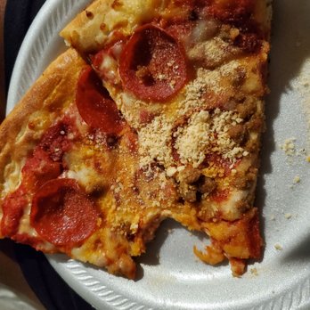 Magical World Pizza - My mouth wouldn't let me wait to take a picture. - Pizza Near Me - Kissimmee, Florida Magical World Pizza - My mouth wouldn't let me wait to take a picture. - Pizza Near Me - Kissimmee, Florida