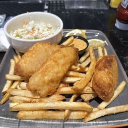 Fish and chips... taste great! I took the photo after messing around with the plate a bit messing up the presentation. Fish and chips... taste great! I took the photo after messing around with the plate a bit messing up the presentation.