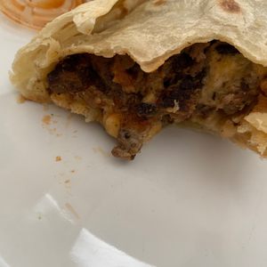 Photo of Los Panchitos Mexican Food - San Diego, CA, United States. Burnt hard carne asada meat :/