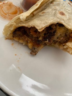 Photo of Los Panchitos Mexican Food - San Diego, CA, US. Burnt hard carne asada meat :/