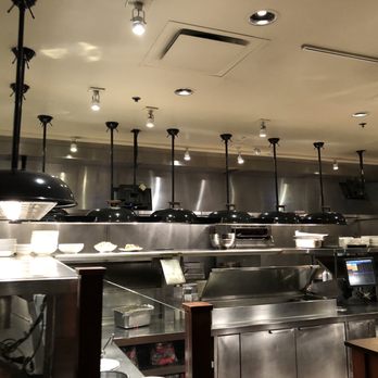 Weber Grill Restaurant - Another kitchen pic - light fixtures like Weber grill lids - Steakhouses Near Me - Indianapolis, Indiana