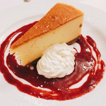 Bud's At Silver Run - Cheesecake served over a Raspberry Glaze - To Die For!! - American Near Me - Westminster, Maryland