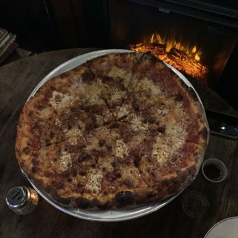 West End Pizza - a large pizza on a platter - Pizza Near Me - Fairfield, Vermont West End Pizza - a large pizza on a platter - Pizza Near Me - Fairfield, Vermont