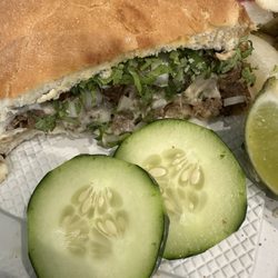 Taquitos La Bombonera 2 - Torta de carne asada.