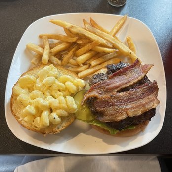The 411 Pub - a plate of food including a burger, fries, and macaroni and cheese - Pubs Near Me - Goodrich, Michigan