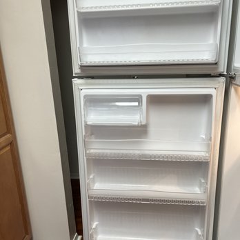 ERCC Cleaning Services - Fridge Door Cleaned and Restored - Home Cleaning Near Me