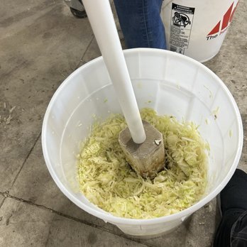 Northern Farm Market - Turning a bucket of shredded cabbage into yummy sauerkraut - Fruits & Veggies Near Me - Bruce Twp, Michigan Northern Farm Market - Turning a bucket of shredded cabbage into yummy sauerkraut - Fruits & Veggies Near Me - Bruce Twp, Michigan