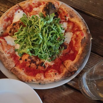 Porta - Arugula Pizza - plenty of arugula. But the dough was too chewy and not crispy enough. Overall it was missing something. - Pizza Near Me - Jersey City, New Jersey