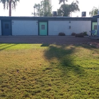 The Flats at Granite Reef - Different colored doors. The blue door means new tenant - Apartments Near Me - Scottsdale, Arizona