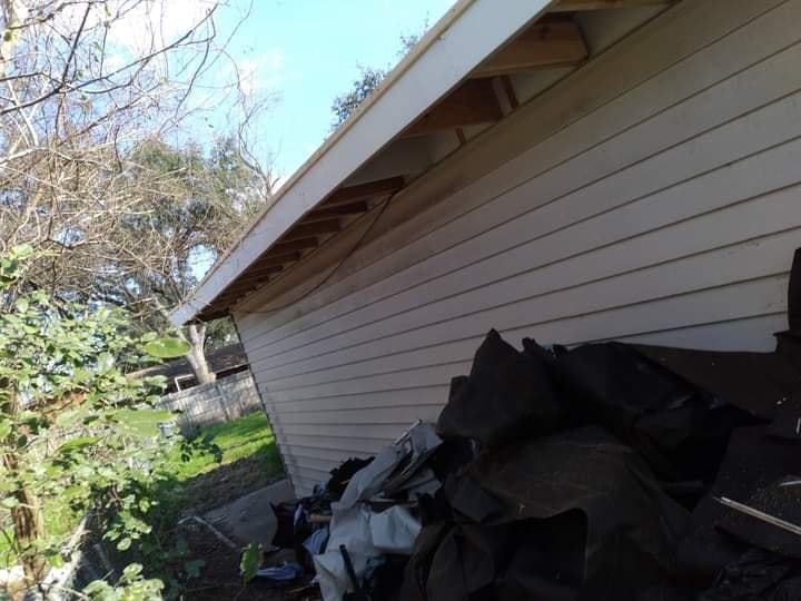 Slide of Bert's Roofing