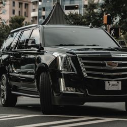 Plush Limo - Cadillac Escalade great for 6 passengers! Luxury black on black!