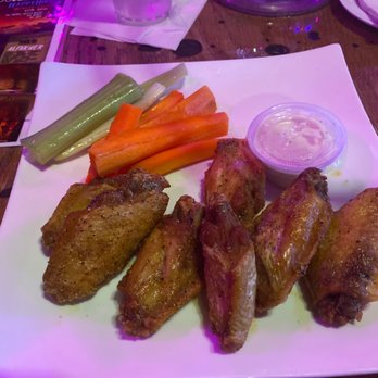 Babylon Fútbol Cafe - a plate of wings, carrots, celery, and pickles - Hookah Bars Near Me - Woodbridge, Virginia