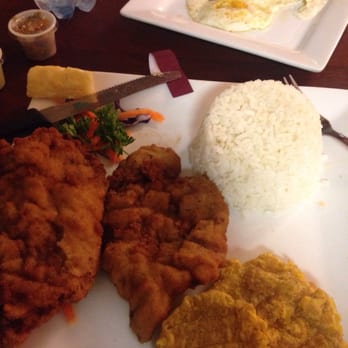 La Antioquena Restaurant - Breaded steak with white rice with eggs and fried green plantains.. Big fan of it all except the plantains - Colombian Near Me - Lake Mary, Florida La Antioquena Restaurant - Breaded steak with white rice with eggs and fried green plantains.. Big fan of it all except the plantains - Colombian Near Me - Lake Mary, Florida