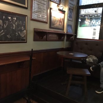 Mulligans Irish Pub - Some low seating - Irish Pub Near Me - Geneva, GE Mulligans Irish Pub - Some low seating - Irish Pub Near Me - Geneva, GE