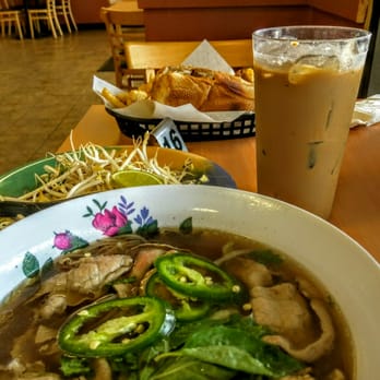 Pho Me - Classic beef Pho $8.29 - I put the basil and jalapeño before taking this photo. - Vietnamese Near Me - Tallahassee, Florida Pho Me - Classic beef Pho $8.29 - I put the basil and jalapeño before taking this photo. - Vietnamese Near Me - Tallahassee, Florida