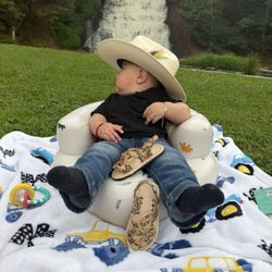 My baby admiring the waterfall.