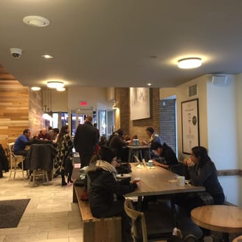 Second Cup - people sitting at tables in a restaurant - Cafes Near Me - Montreal, Quebec