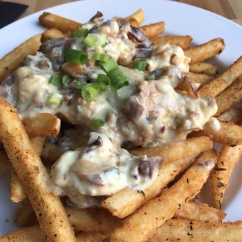 Wissota Chophouse - Chippewa Falls - Seasoned fries with blue cheese and Neuske's bacon. - Steakhouses Near Me - Chippewa Falls, Wisconsin