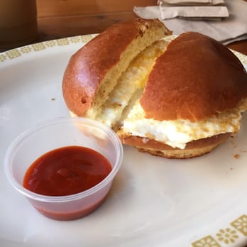Rex - Chorizo, egg and cheese with a side of hot sauce! - Coffee & Tea Near Me - New York, New York Rex - Chorizo, egg and cheese with a side of hot sauce! - Coffee & Tea Near Me - New York, New York