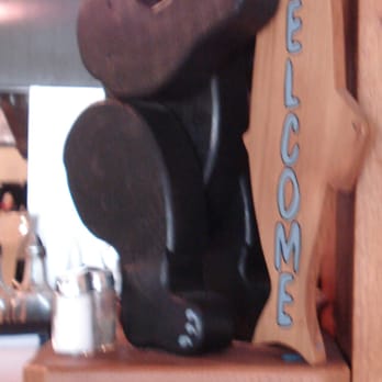 Scarlet Ibis - The bear welcomes you. - Burgers Near Me - Holberg, British Columbia