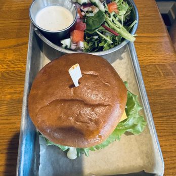 Falcon's Nest - Afterburner (fish sandwich) and check out that good looking side salad. - Bars Near Me - Fernandina Beach, Florida Falcon's Nest - Afterburner (fish sandwich) and check out that good looking side salad. - Bars Near Me - Fernandina Beach, Florida