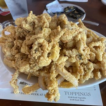 Choate Bridge Pub & Restaurant - Just a few French Fries and just enough thin cut onion rings. Overwhelming amount of Clams - Pubs Near Me - Ipswich, Massachusetts Choate Bridge Pub & Restaurant - Just a few French Fries and just enough thin cut onion rings. Overwhelming amount of Clams - Pubs Near Me - Ipswich, Massachusetts