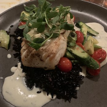 Wild Fish - I believe this was the sablefish on top of black rice, veggies  with a feta yogurt sauce- AMAZING! - Seafood Near Me - Pacific Grove, California