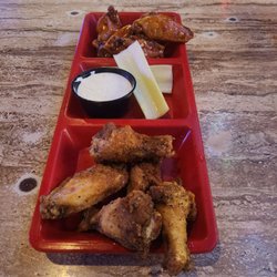 No Frills Grill & Sports Bar - Cajun butter and mango habanero wings