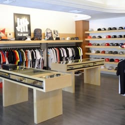 Explicit Streetwear - A glimpse of the hat wall.