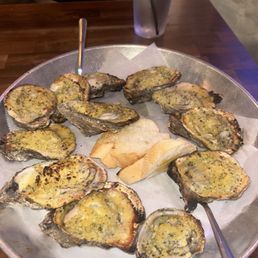Chargrilled New Orleans Char Oysters @nhueats_ soooo good! Chargrilled New Orleans Char Oysters @nhueats_ soooo good!