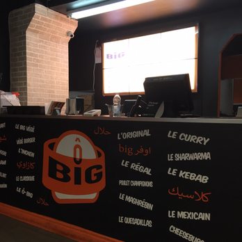 Ô-Big - a black counter with a menu on it - Burgers Near Me - Montreal, Quebec Ô-Big - a black counter with a menu on it - Burgers Near Me - Montreal, Quebec
