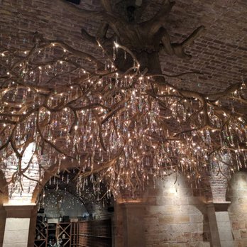 HALL Rutherford - The beautiful chandelier that is meant to look like the vine roots. - Wine Tours Near Me - St. Helena, California