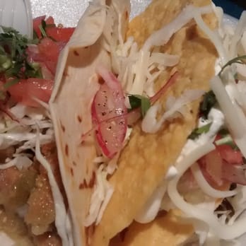 Grumpy Gringo - Crispy pork skin taco (chicharron) and a lengua (tongue) taco with cheese. You can choose flour or corn jard or soft taco shells - Mexican Near Me - St. Petersburg, Florida Grumpy Gringo - Crispy pork skin taco (chicharron) and a lengua (tongue) taco with cheese. You can choose flour or corn jard or soft taco shells - Mexican Near Me - St. Petersburg, Florida