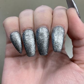 Caesars Nails & Spa - My ring finger cuticle scabbed up, nails lined up at cuticles and all different in length - Nail Salons Near Me - Austin, Texas