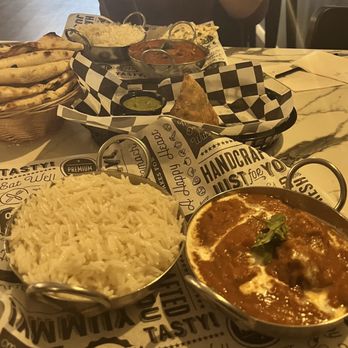 Tikka Tangy - Paneer tikka masala, chicken masala, and garlic naan. - Indian Near Me - Chesterfield, Missouri Tikka Tangy - Paneer tikka masala, chicken masala, and garlic naan. - Indian Near Me - Chesterfield, Missouri