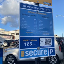 Kaimuki Municipal Parking - The parking ticket is on a thin paper slip. Scan to pay at the machine before exiting and you have 15 min grace period to leave.