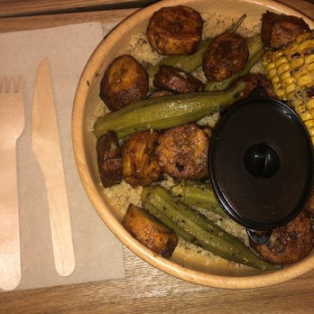 New Soul Food - This is a vegetarian meal with couscous, sweet plantains, okra, and grilled corn with a coconut sauce which is amazing - Food Trucks Near Me New Soul Food - This is a vegetarian meal with couscous, sweet plantains, okra, and grilled corn with a coconut sauce which is amazing - Food Trucks Near Me