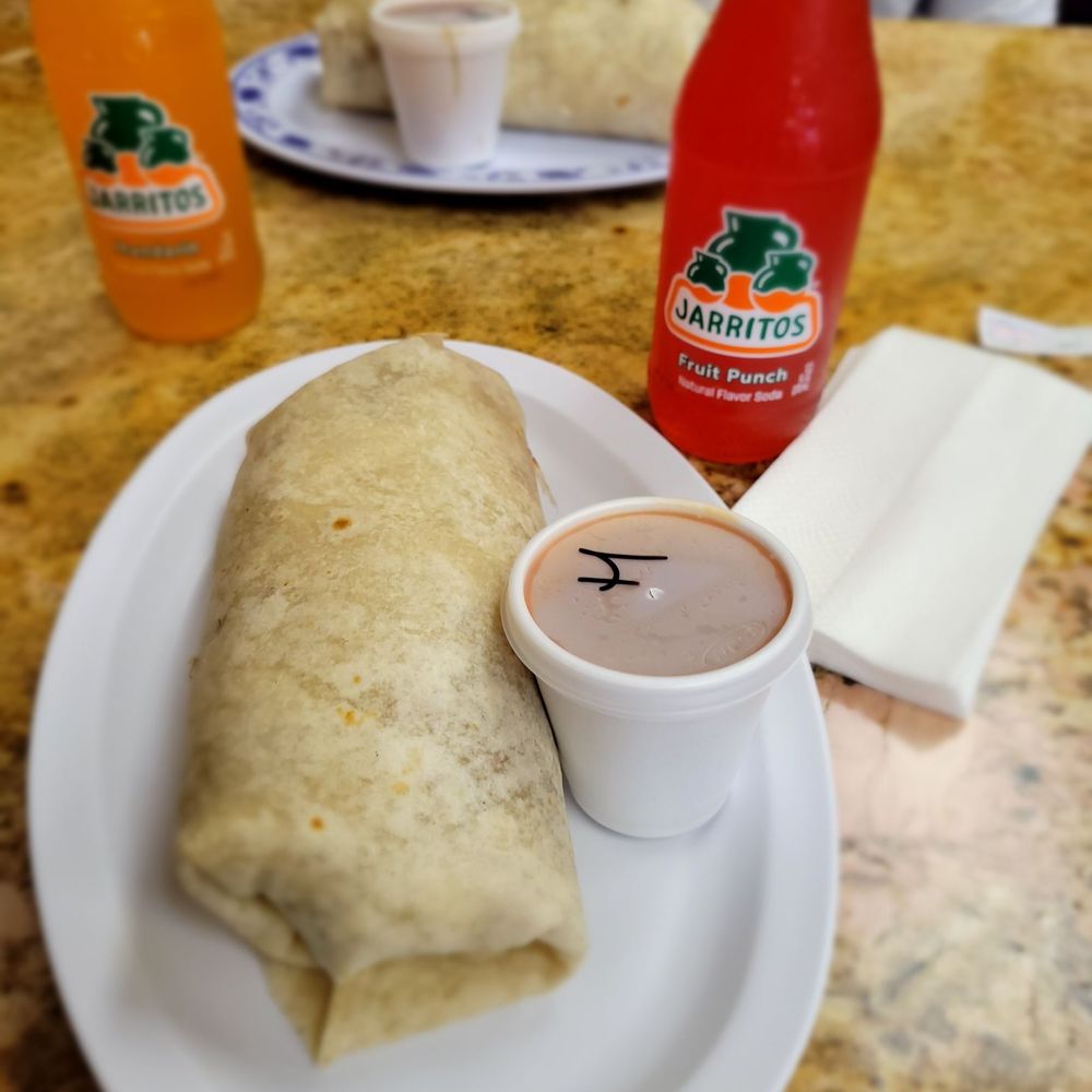 La Flor De Michoacan - Carnitas SUPER burrito - Salvadoran Near Me - Sacramento, California La Flor De Michoacan - Carnitas SUPER burrito - Salvadoran Near Me - Sacramento, California