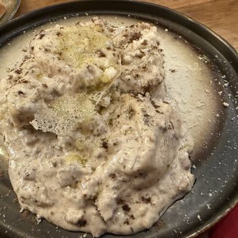 Paisano Bistró  - Raviolo with mushroom, truffle, Parmesan, cream, and sausage. - Cafeteria Near Me - Barcelona, B