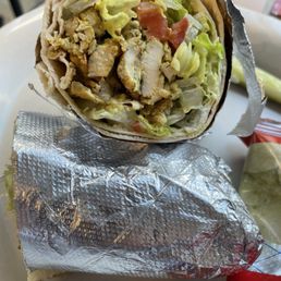 Chicken "schwarma" wrap with charged-for garlic sauce (can you see it?). Chicken "schwarma" wrap with charged-for garlic sauce (can you see it?).