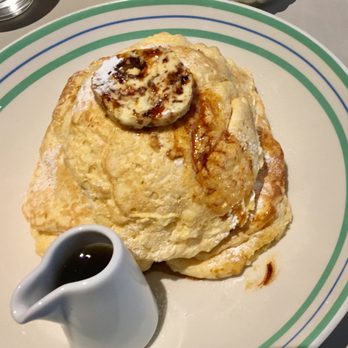 Granger & Co - Riccotta hotcakes w/ honey butter + banana - Modern European Near Me - London, XGL Granger & Co - Riccotta hotcakes w/ honey butter + banana - Modern European Near Me - London, XGL