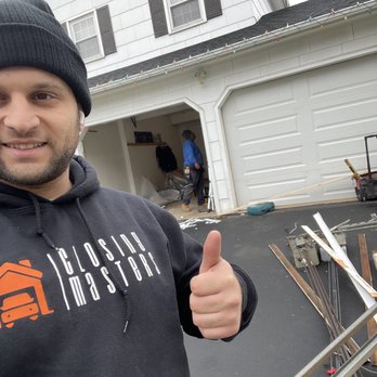Closing Masters - Alonzo the boss installing new garage door. - Garage Door Services Near Me