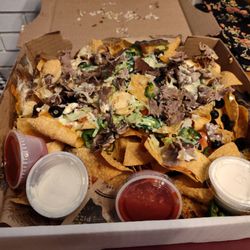 TC Hooligans - Greece - Nachos...this is literally enough for 4 people...I added shaved steak to it for 6 bucks