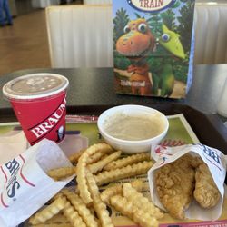Kids meal, 2 chicken strips with fries & side of gravy.
